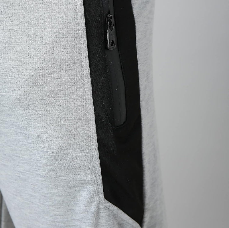 Laad afbeelding in Galerijviewer, Heren joggingbroek van katoenmix met zakken en print – sportbroek – trainingsbroek
