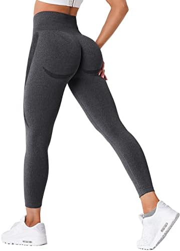 Load image into Gallery viewer, Een persoon die de &quot;Ervaar ultiem comfort en stijl met onze compressie sportlegging!&quot; in donkergrijs met hoge taille en witte sneakers, zijwaarts staand.
