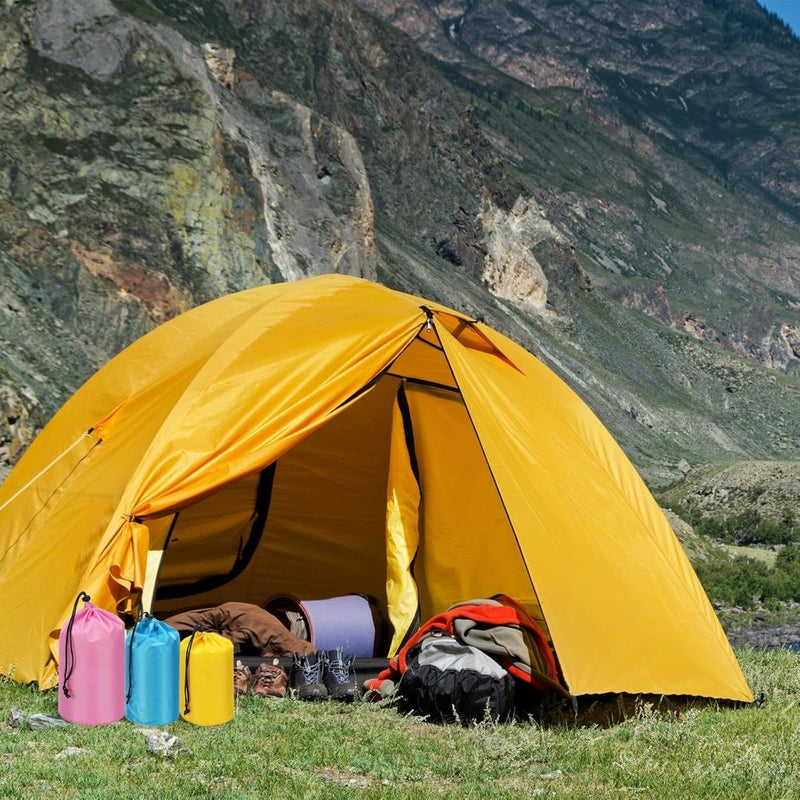 Laden Sie das Bild in Galerie -Viewer, Waterdichte opbergzak 11 x 20 cm met trekkoord oranje – stuff sack – camping accessoires - happygetfit.com
