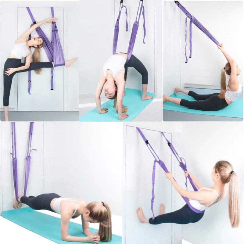Load image into Gallery viewer, Een vrouw voert op elegante wijze aerial yoga poses uit met behulp van de &quot;Verbeter je flexibiliteit met de beste yogariem.&quot; De paarse banden en turquoise mat tegen een witte muur in een lichte kamer benadrukken haar focus op veelzijdigheid en het verbeteren van haar beoefening.
