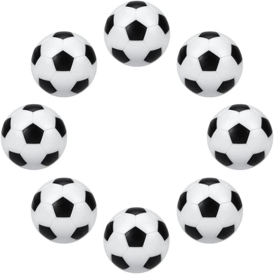 Zeven zwart-witte voetballen vormen een cirkel op een witte achtergrond. Gemaakt van duurzaam ABS-kunststof, deze zorgen voor eindeloos speelplezier als tafelvoetbal balletjes. Product: Nooit meer zonder reserve ballen tijdens een tafelvoetbalwedstrijd met onze hoogwaardige tafelvoetbal balletjes!.