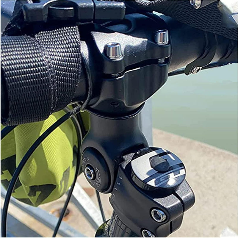 Load image into Gallery viewer, Close-up van een fietsstuur met de &quot;Verstelbare stuurpen: de perfecte stuurpositie voor elke fietser&quot;, gemaakt van 6061 aluminiumlegering, met een gele tas eraan bevestigd, tegen een buitenachtergrond voor ultiem comfort.
