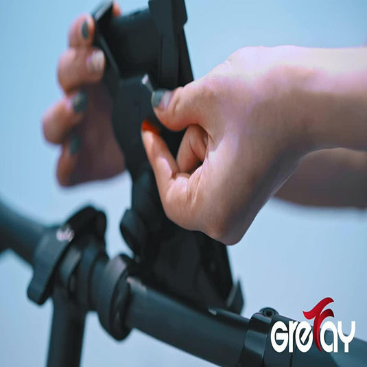 Handpositionering "De ultieme stevige fiets telefoonhouder voor veilig fietsplezier" met 360° rotatie op een fietsstuur.