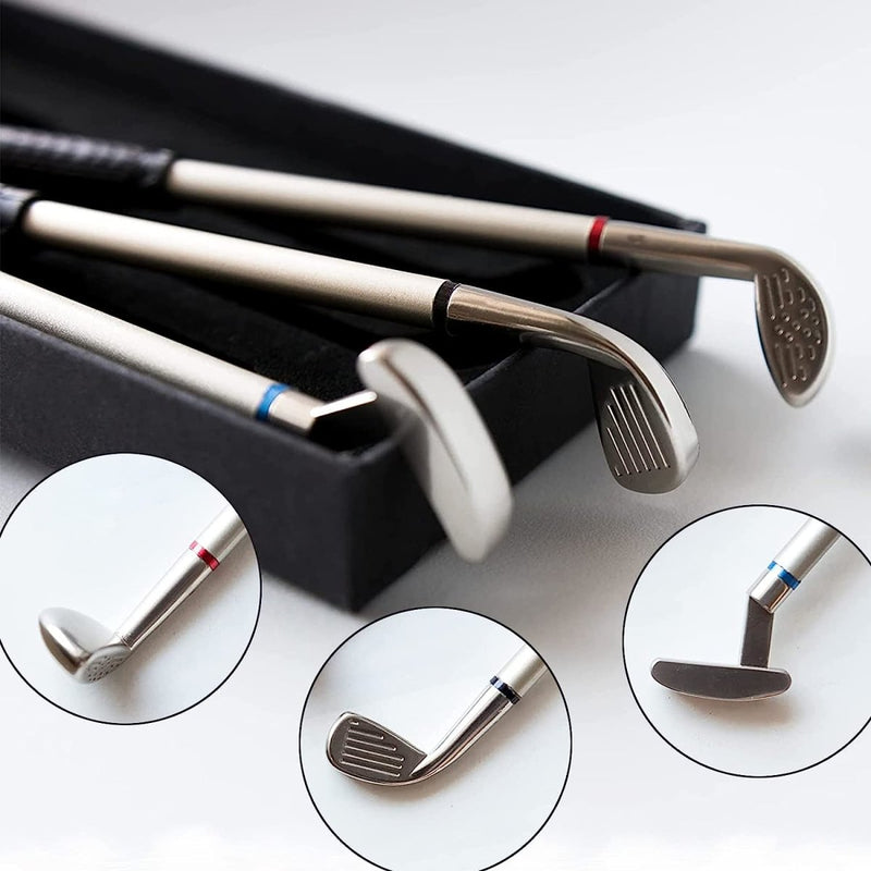 Laad afbeelding in Galerijviewer, Een set van vier stijlvolle Golfclub pennensets met zilveren shafts en zwarte grips, elk met een andere clubkop, elegant gepresenteerd op een wit oppervlak naast een strakke zwarte behuizing, gemaakt van duurzame materialen.
