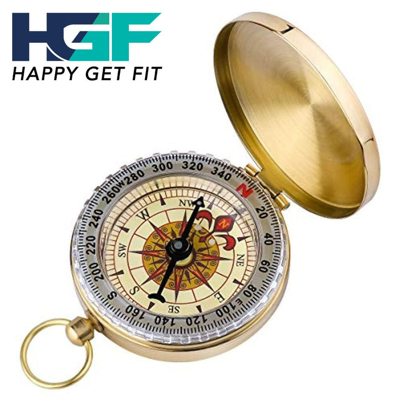 Laad afbeelding in Galerijviewer, Een goudkleurige Happygetfit zakkompas, voorzien van een decoratief gezicht en richtingaanwijzers, ligt open. Dit veelzijdige navigatiegereedschap toont een logo met de tekst &quot;HAPPY GET FIT&quot; in de linkerbovenhoek.
