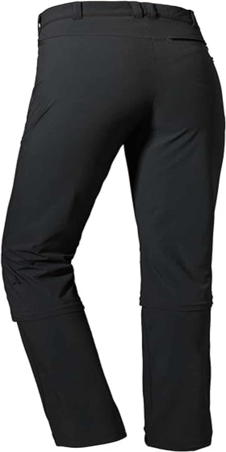 Laad afbeelding in Galerijviewer, Ontdek de perfecte zwarte convertible outdoorbroek voor dames, met een slim fit met S.Café ICE-CAFÉ-technologie en 4-way stretch. De afritsbare pijpen bieden een eenvoudige conversie van volledige lengte naar shorts, waardoor het een ideale keuze is voor veelzijdige avonturiers. Productnaam: Ontdek de perfecte wandelbroek voor dames - Zwart.
