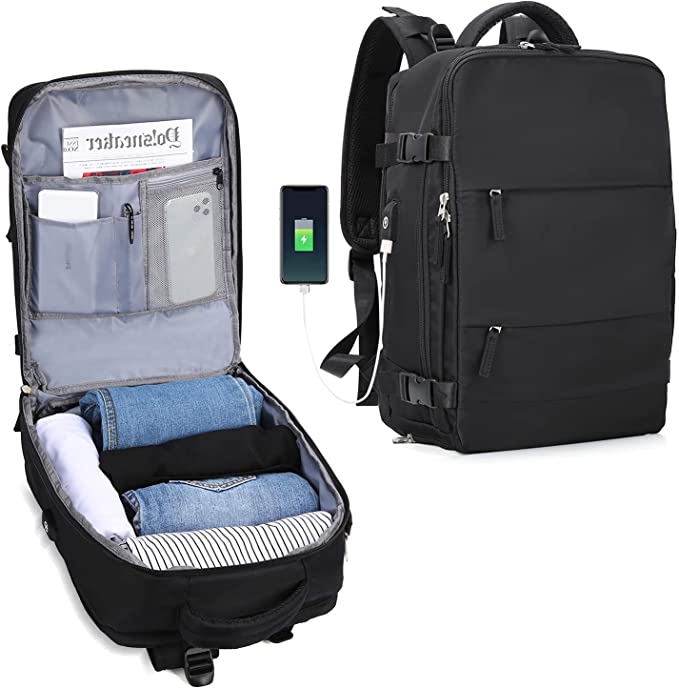 Laad afbeelding in Galerijviewer, De ultieme reisrugzak voor elk avontuur, gemaakt van duurzaam polyester, een open compartiment voor kledingorganisatie, een externe USB-oplaadpoort aan de zijkant en meerdere ritsen en zakken voor extra gemak.
