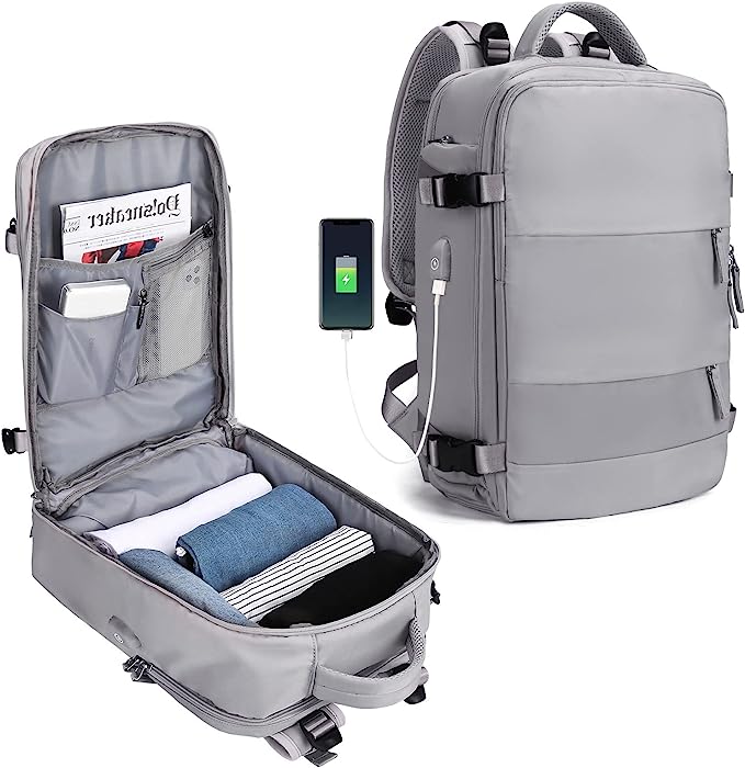 Laad afbeelding in Galerijviewer, De &quot;De ultieme reisrugzak voor elk avontuur&quot; is een grijze reisrugzak gemaakt van duurzaam polyester, voorzien van een USB-oplaadpoort. Het biedt binnenvakken voor kleding en tijdschriften, met een strak ontwerp en oplaadmogelijkheden.
