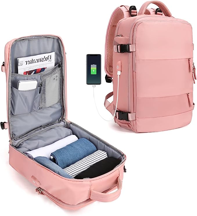 Laad afbeelding in Galerijviewer, De ultieme reisrugzak voor elk avontuur in roze, gemaakt van duurzaam polyester, met meerdere open compartimenten gevuld met kleding en een boek. Met externe USB-oplaadpoort waarop een telefoon is aangesloten en wordt opgeladen.
