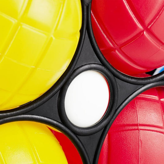Close-up van een zintuiglijk fidget-speeltje met rode, gele en witte getextureerde bubbels in een zwart frame, dat doet denken aan 'Beleef het plezier van boccia: Kleurrijk jeu de boules spel voor jong en oud!.