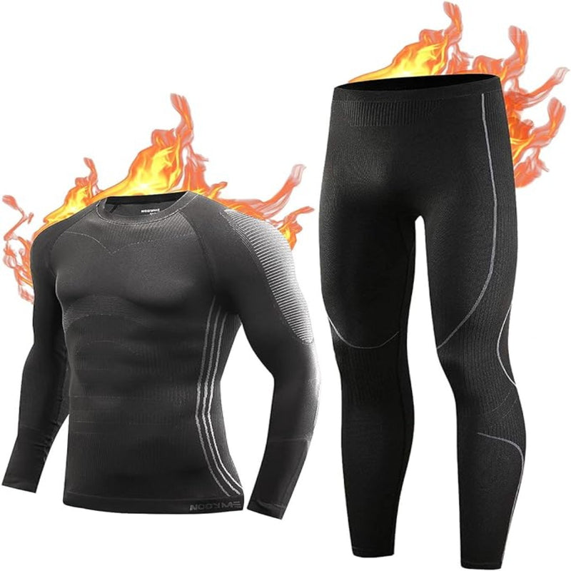 Laad afbeelding in Galerijviewer, De set Warm, comfortabel en flexibel thermo-ondergoed voor heren bestaat uit een zwart thermisch shirt en een broek gemaakt van bamboekoolstofvezel, met vlamontwerpen die de warmte- en vochtregulerende eigenschappen benadrukken.
